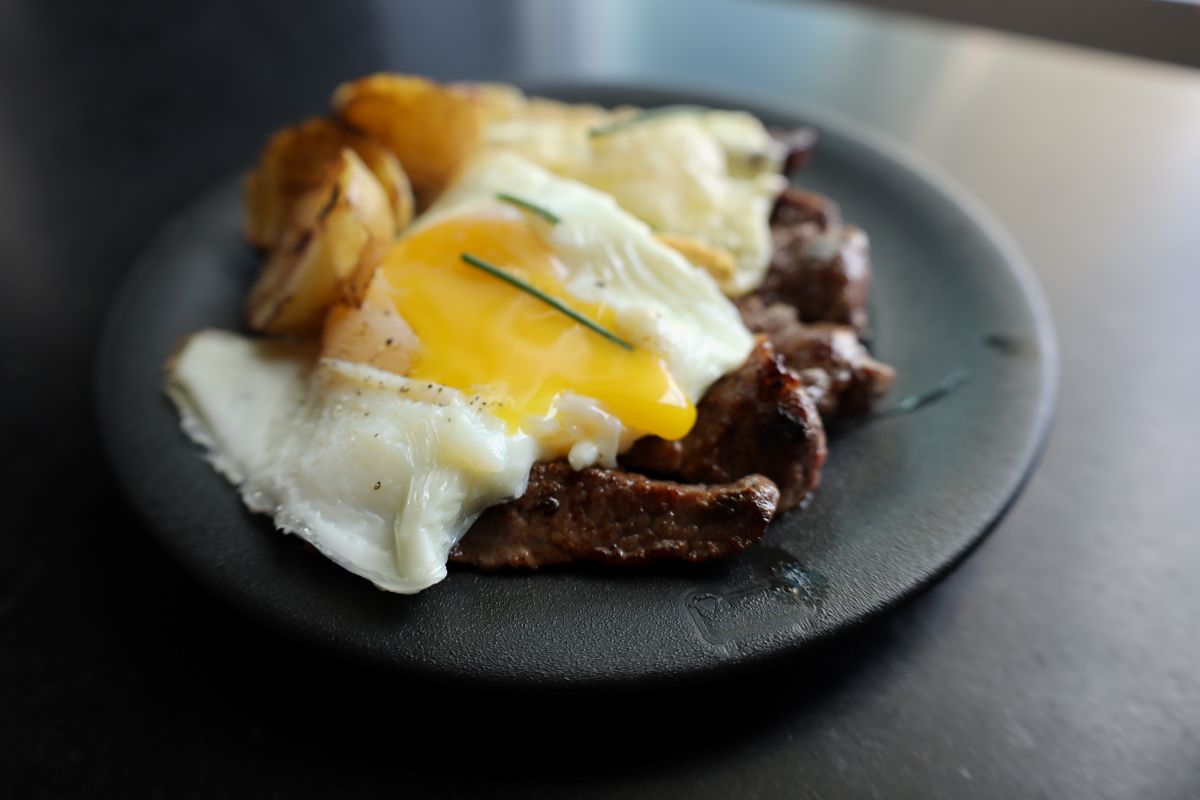 steak and egg raclette