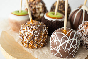 plate of assorted caramel apples