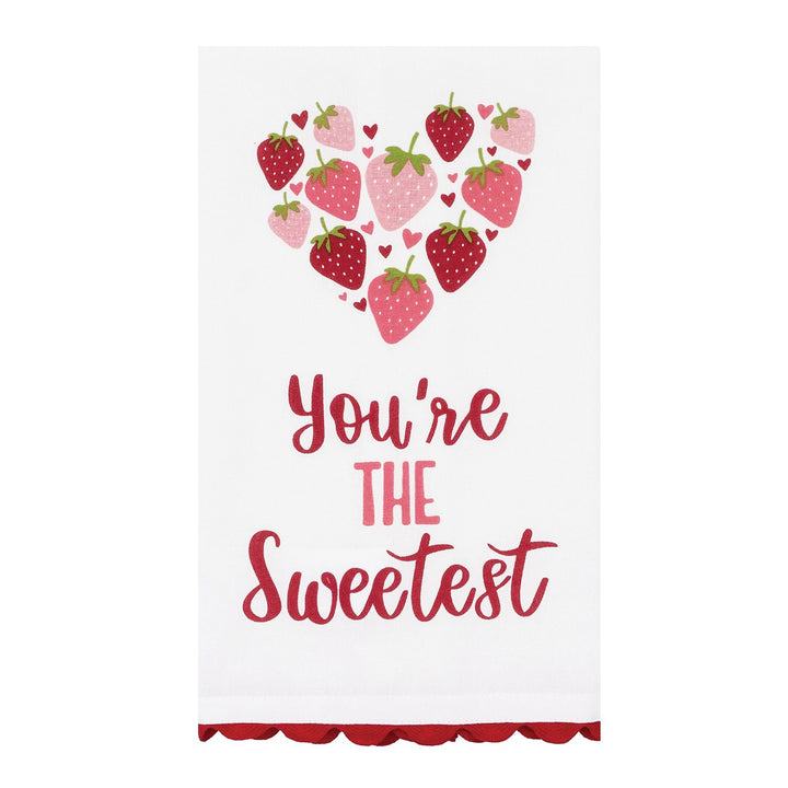 Kitchen towel with heart-shaped arrangement of strawberries with 'You're The Sweetest' text and red scalloped bottom edge on a white background.
