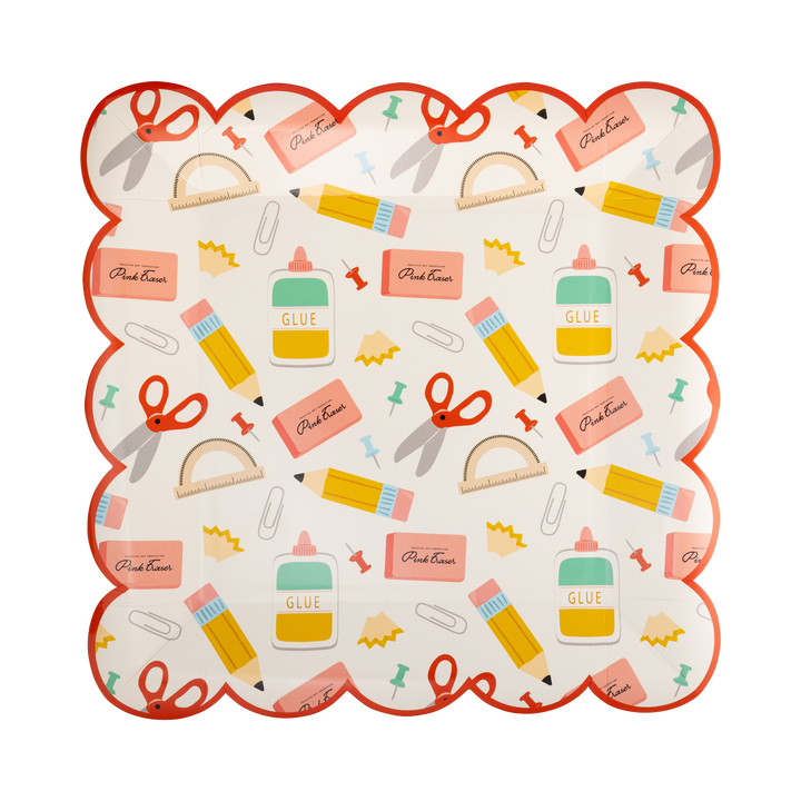 Decorative plate with stationery-themed illustrations on a white background