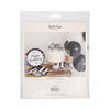 Back of packaging  for cake topper featuring a picture and brand information, on a white background