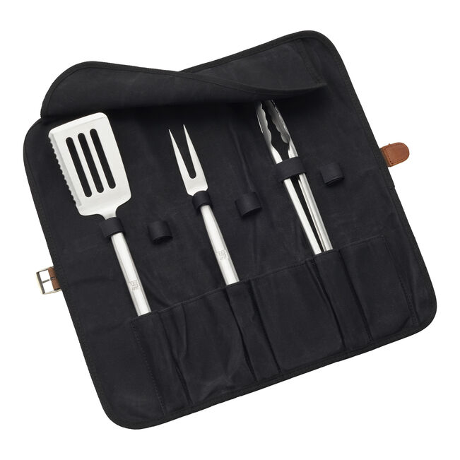 Set of barbecue utensils in a black carrying case on a white background