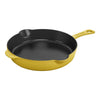 Yellow cast iron skillet on a white background