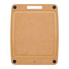 Brown cutting board with black corners and deep juice groove on a white background