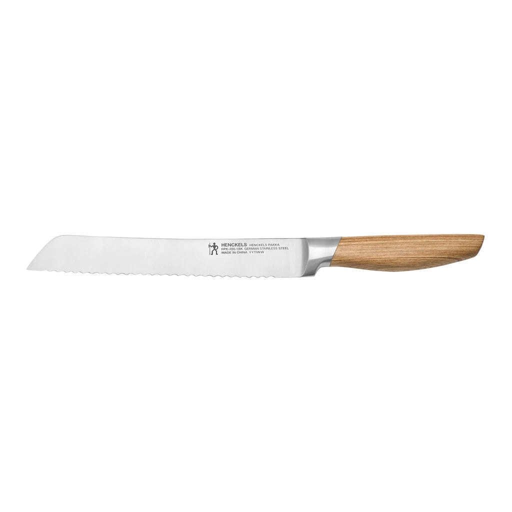 Bread knife with wooden handle on a white background