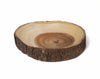 A round natural wood slice shallow bowl with a rough bark edge and a smooth light wood interior, shown on a plain white background.