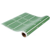 Roll of green paper with white line pattern on a white background