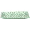 Rectangular tray with white floral pattern on a light green background