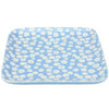 Rectangular blue tray with white floral pattern on a white background