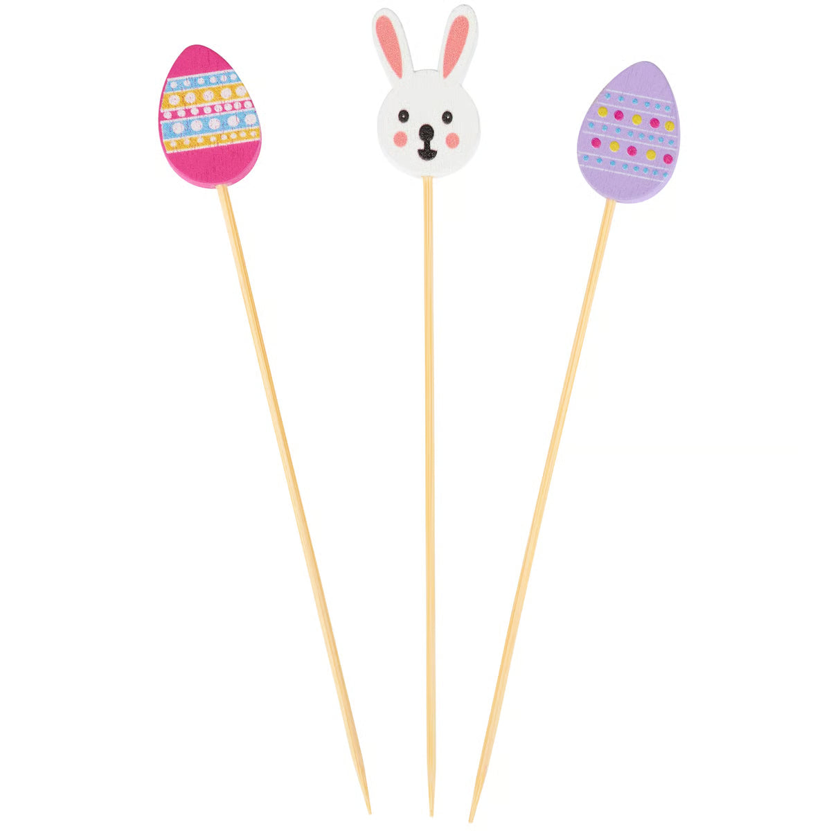 Three decorative toothpicks with Easter-themed designs on a white background