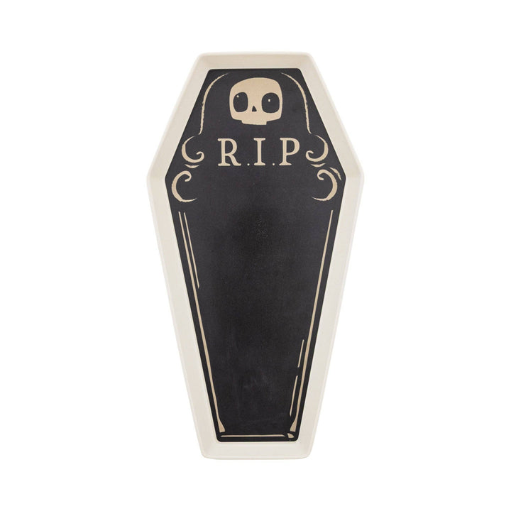 A coffin-shaped black serving tray with a cream-colored border, featuring a skull icon and the text 'R.I.P