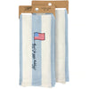 Packaged kitchen towel with American flag and 'Happy 4th of July' text on a white background