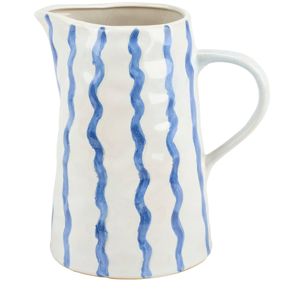 Ceramic pitcher with blue wavy patterns on a white background