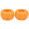 Two small orange pumpkin-shaped candle holders with a ribbed design, shown side by side on a plain white background.