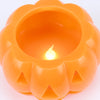 An orange plastic jack-o'-lantern-shaped candle holder with a glowing LED flame effect inside, shown on a clean white background.