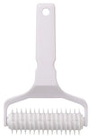 White lattice cutter with handle on a white background