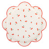 Decorative scalloped edge paper plate with cherry pattern on a white background