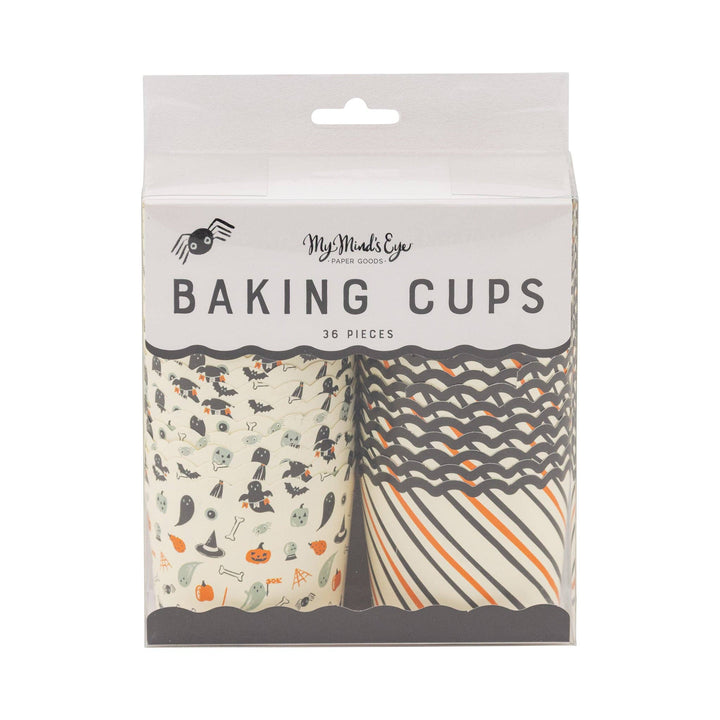 A package of My Minds Eye Baking Cups featuring Halloween-themed designs: a cream cup with black spider, bat, witch, and pumpkin motifs, and a cream cup with black and orange diagonal stripes.