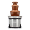 A Sephira brand chocolate fountain with a flowing chocolate tiered structure on a brushed stainless steel base with black feet, shown against a plain white background.