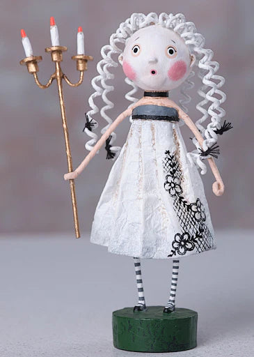 Artistic doll with white hair, white dress, and striped shoes holding a candlestick on a gray background