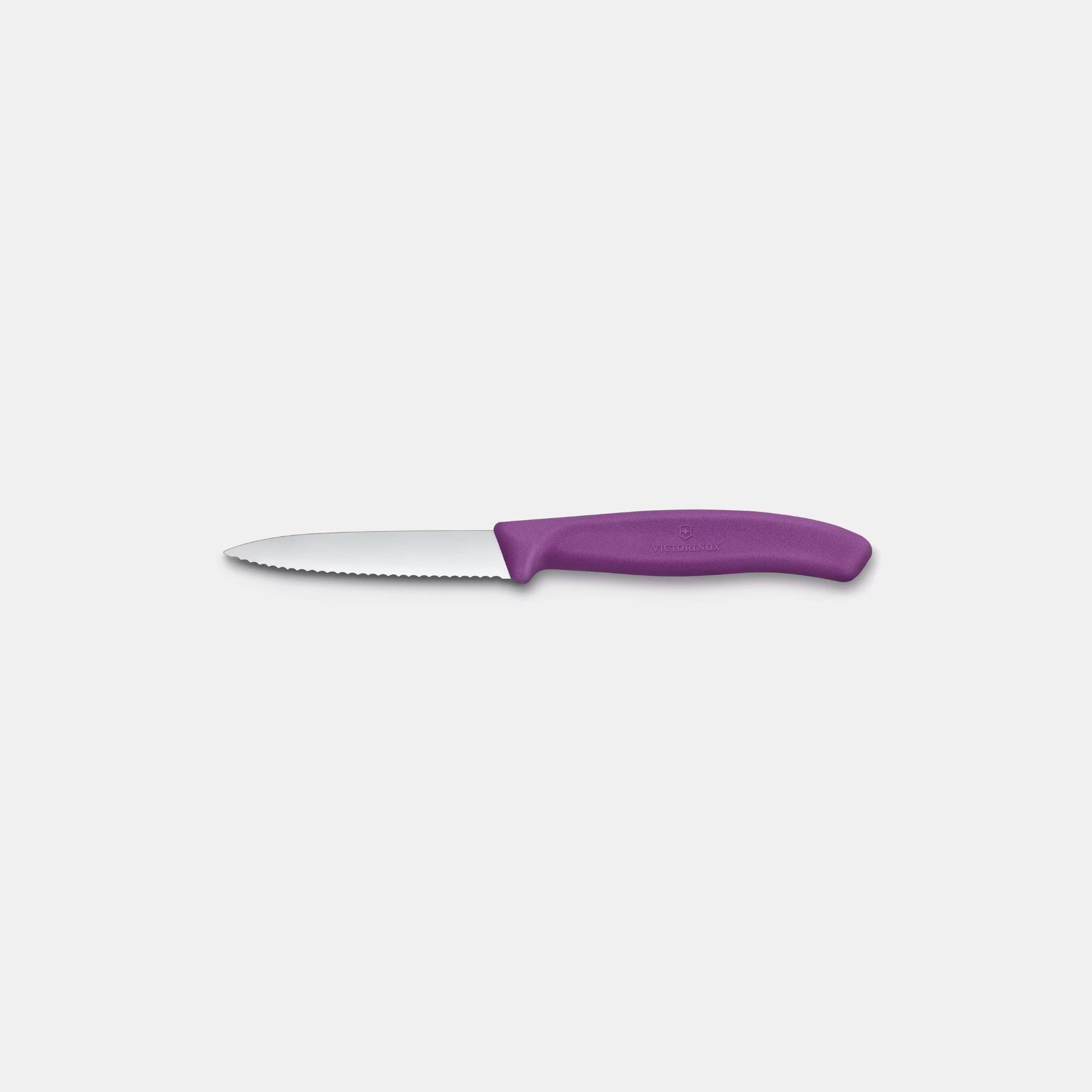 Knife with a purple handle on a white background