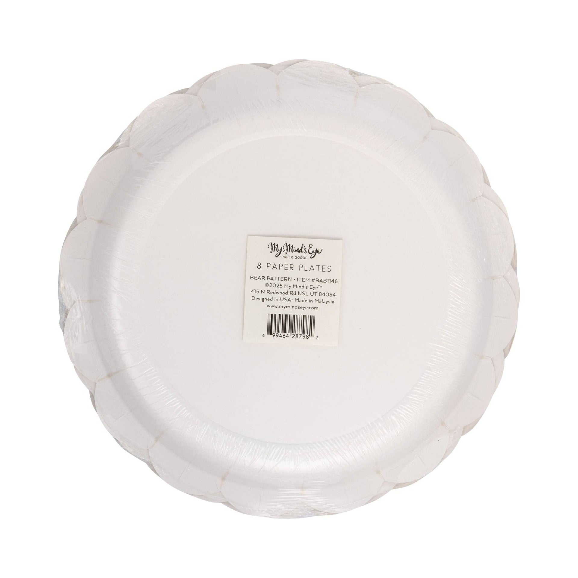 Bottom view of paper plates with a visible brand label on a white background
