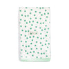 Napkins with green shamrock pattern on a white background
