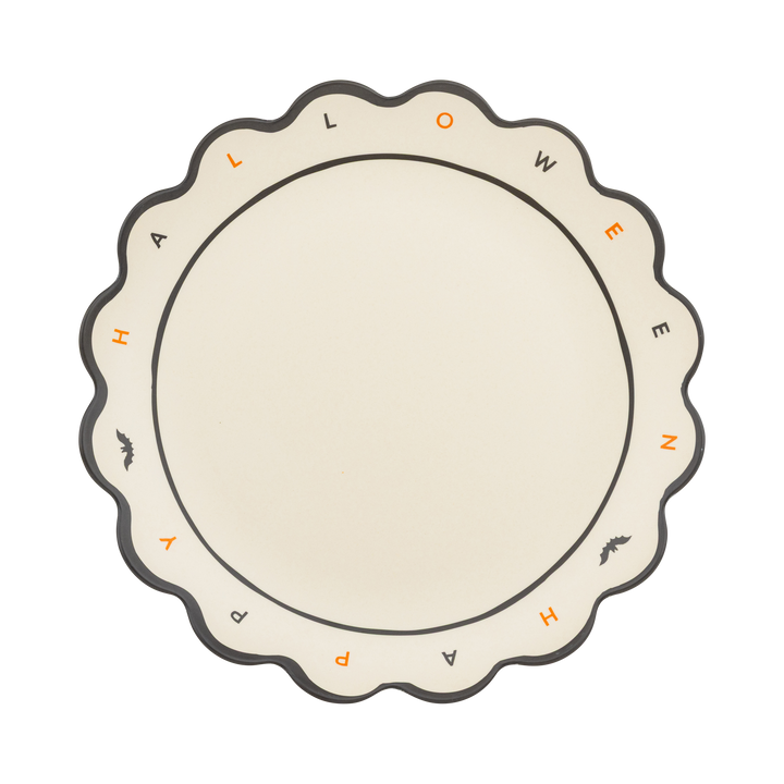 Round paper plate with 'HALLOWEEN' text on a white background