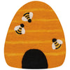 Orange beehive shaped trivet with black and white bee designs on a white background