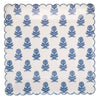 Scalloped edge paper plate with blue floral pattern