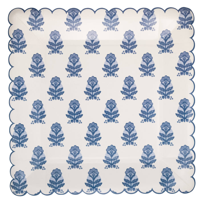 Scalloped edge paper plate with blue floral pattern