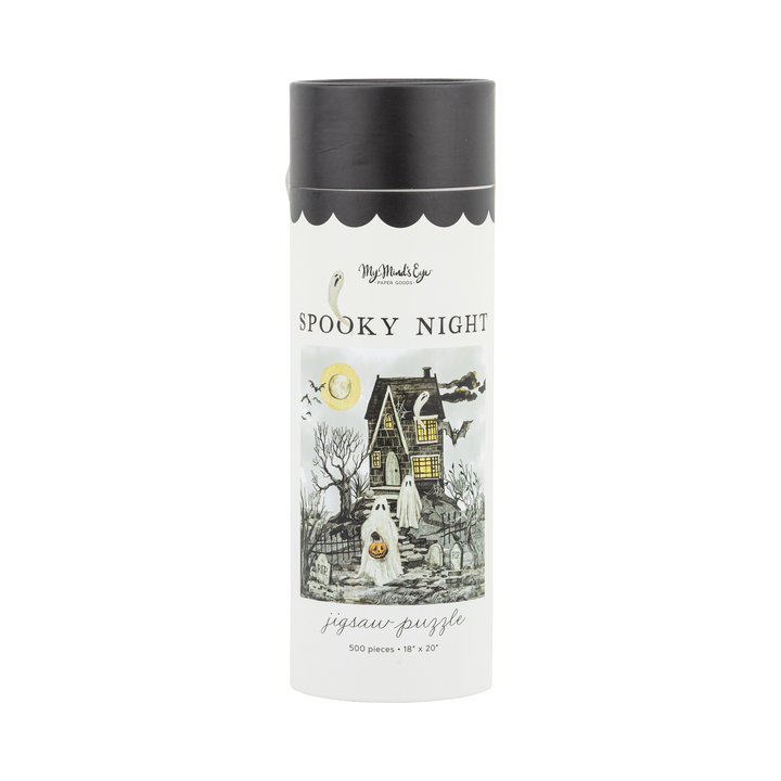 A cylindrical white puzzle box with a black lid, featuring a spooky night illustration with a haunted house, ghost, bats, and moon. The text reads 'Spooky Night jigsaw puzzle'.