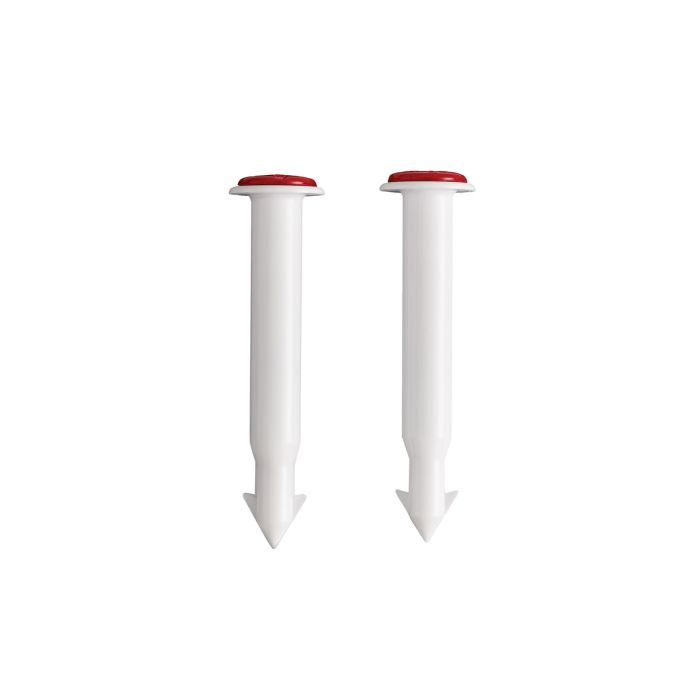 Two white plastic pop-up timers with red caps on a white background