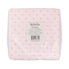 Packaged napkins with gold polka dots on a light pink background, featuring a label with text.