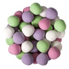 Pastel-colored round mints on a white background