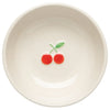 White stoneware bowl with red cherries on a white background