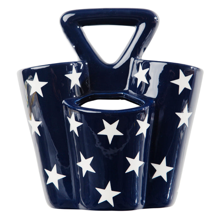 Navy blue ceramic caddy with white star patterns on a white background