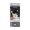 Packaging of reusable straws with a glass of milk and pencils on a white background