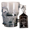 Skull-shaped glass mug with a tag on a white background