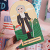 Puzzle with illustration of George Washington held by a hand against a colorful background