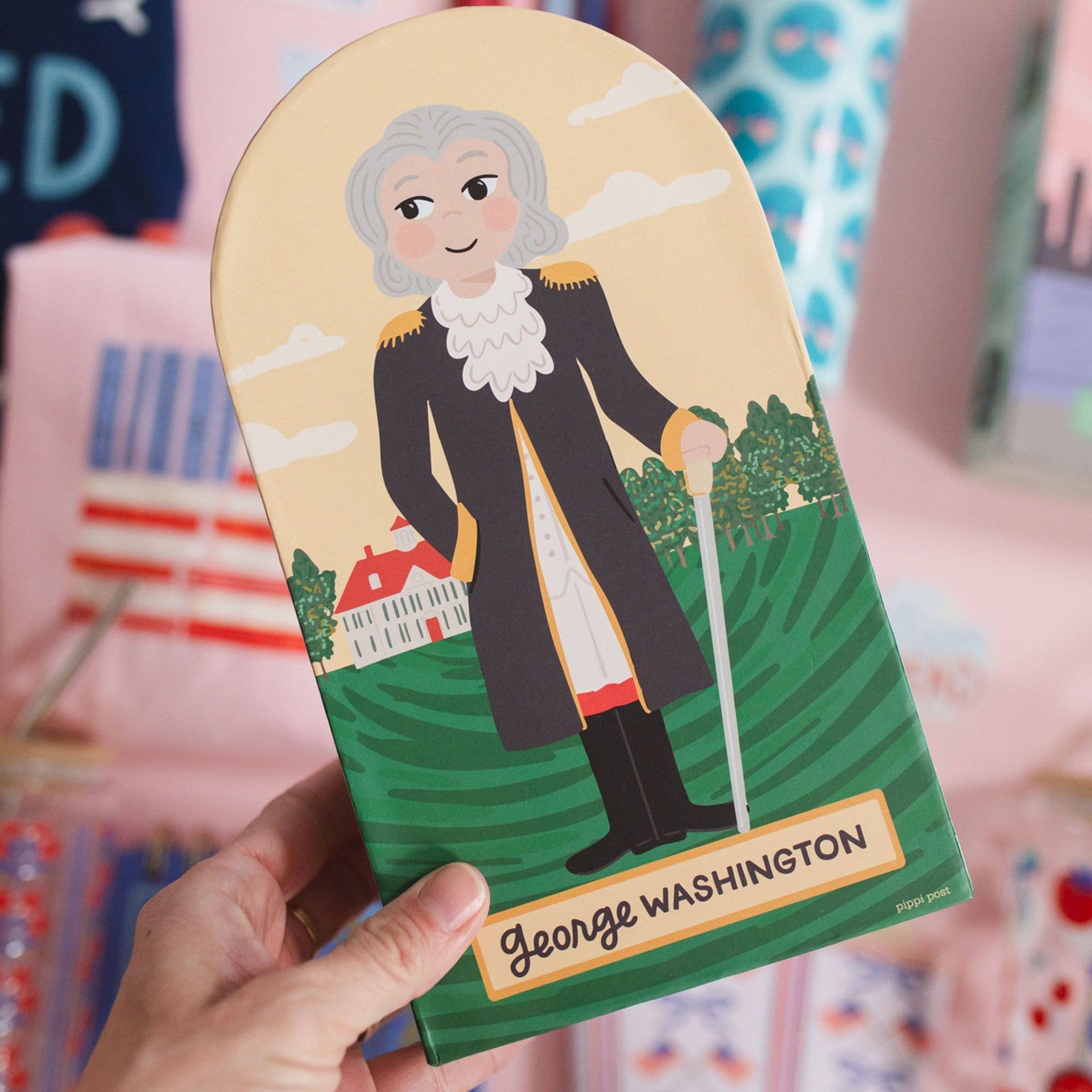 Puzzle with illustration of George Washington held by a hand against a colorful background