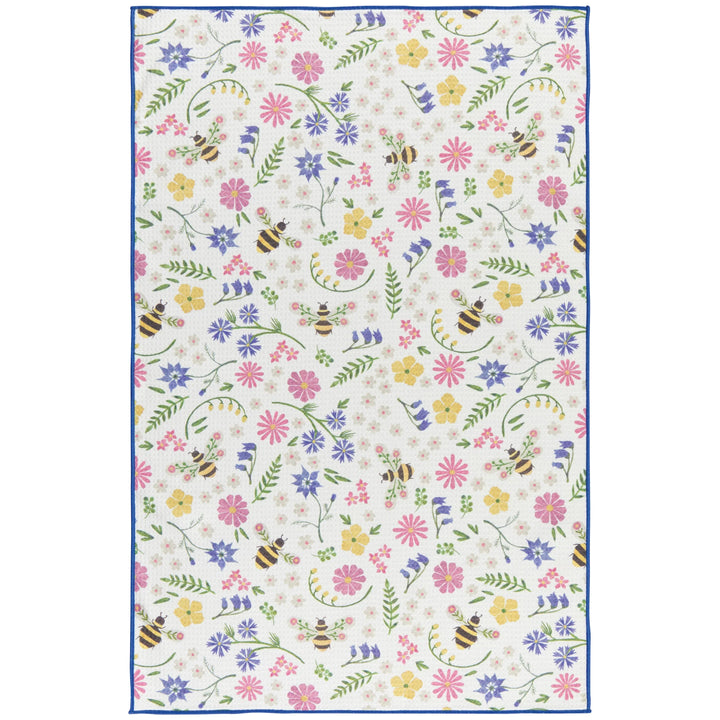 Floral patterned kitchen towel with flowers and bees on a white background