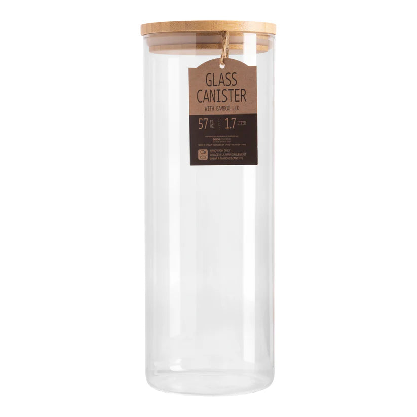 Clear glass canister with a wooden lid on a white background
