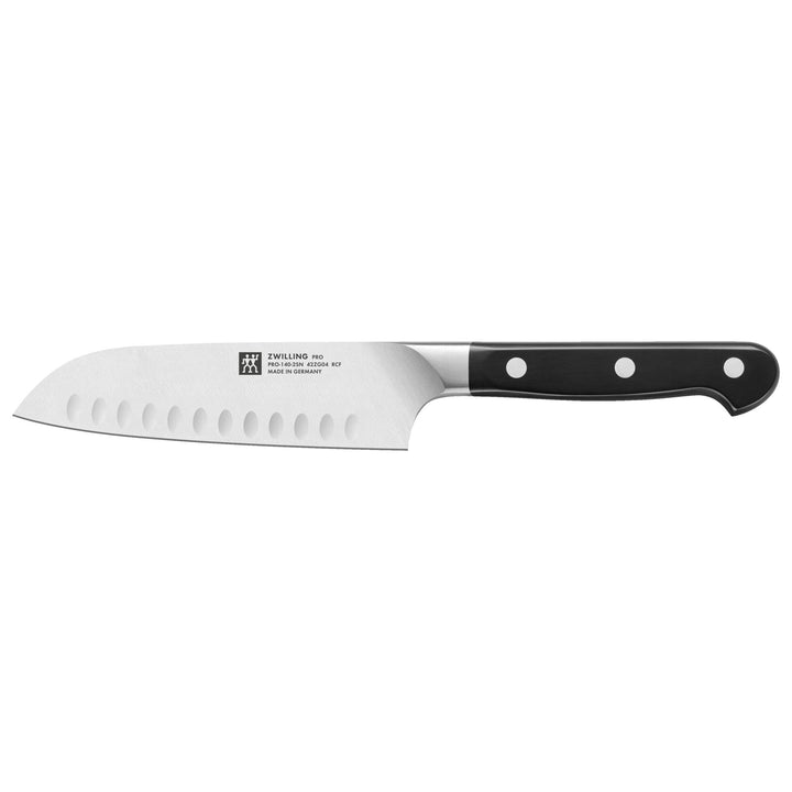 Santoku knife with a black handle on a white background