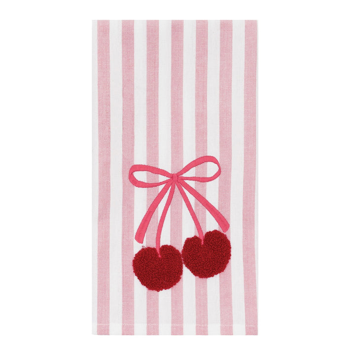 A rectangular kitchen towel with vertical pink and white stripes, featuring an embroidered design of two red cherries tied together with a pink ribbon.