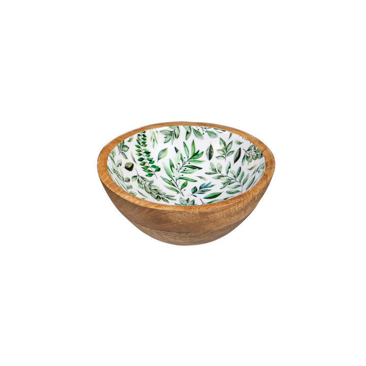 Wooden bowl with a green leaf pattern on a white background