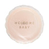 Package of pink baby plates with 'Welcome Baby' text on a white background