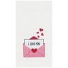 A white waffle-weave kitchen towel featuring a graphic of a pink envelope with a red heart, a white card reading 'I LOVE YOU', and four small red hearts floating above.