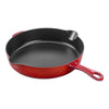 Red cast iron skillet on a white background