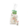 Set of individually wrapped bunny-shaped marshmallow candy in a clear bag with a green ribbon on a white background
